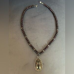 Designer made silver necklace with natural gemstones.